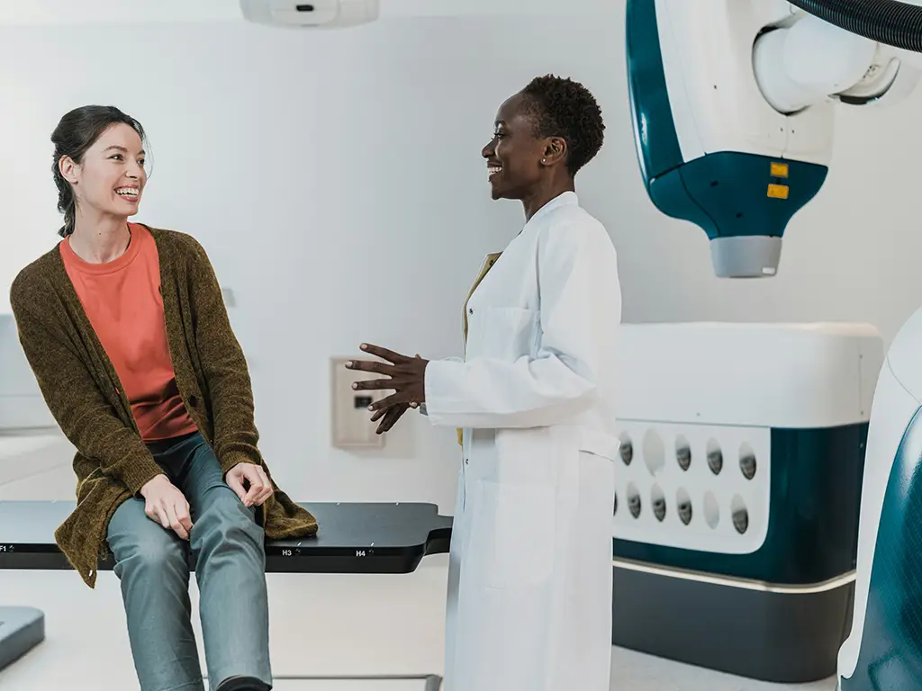 doctor talking to a patient about intelligent healthcare